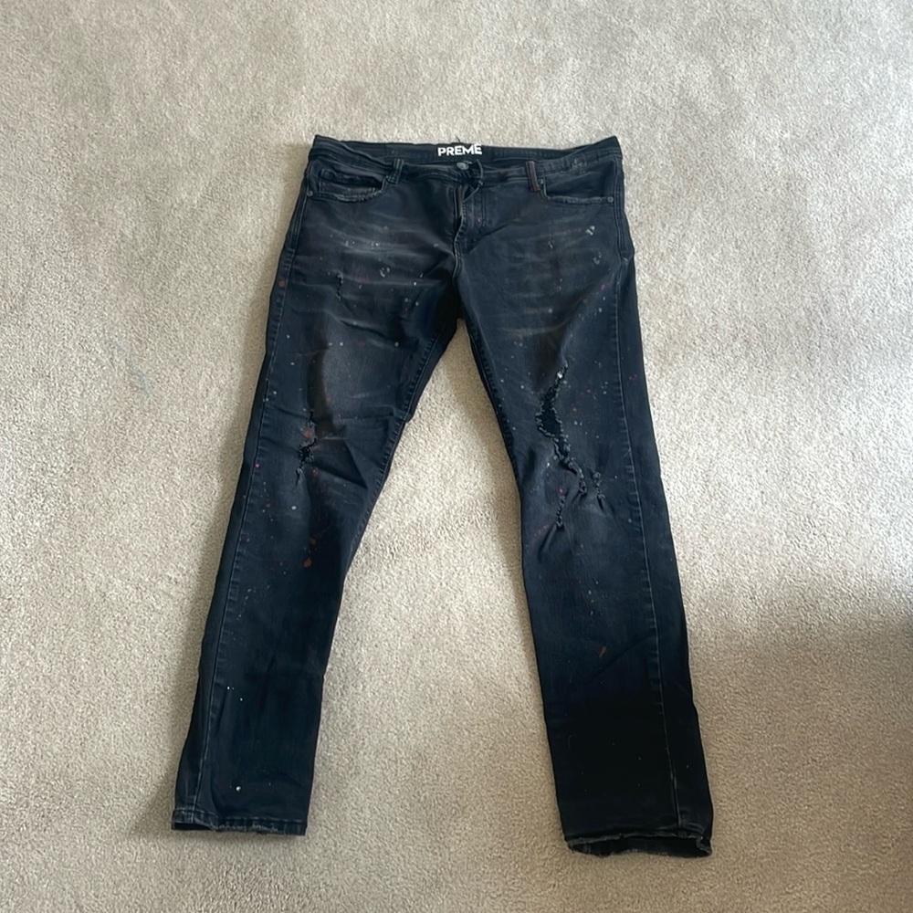 Men’s paint splattered black jeans